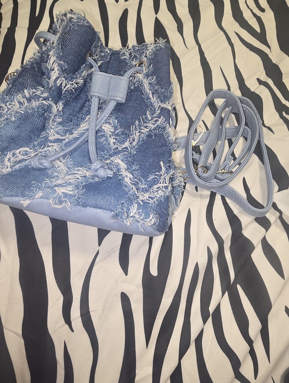 Frayed Denim Bucket Shoulder Bag in Light Blue